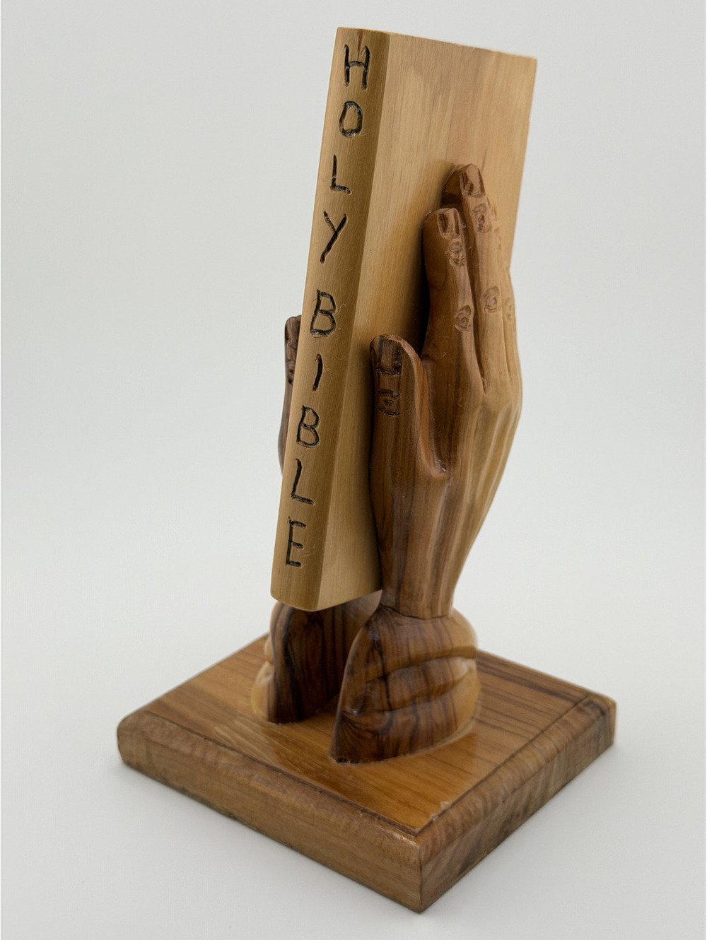 Carved Wood Praying Hands Holding Holy Bible Sculpture